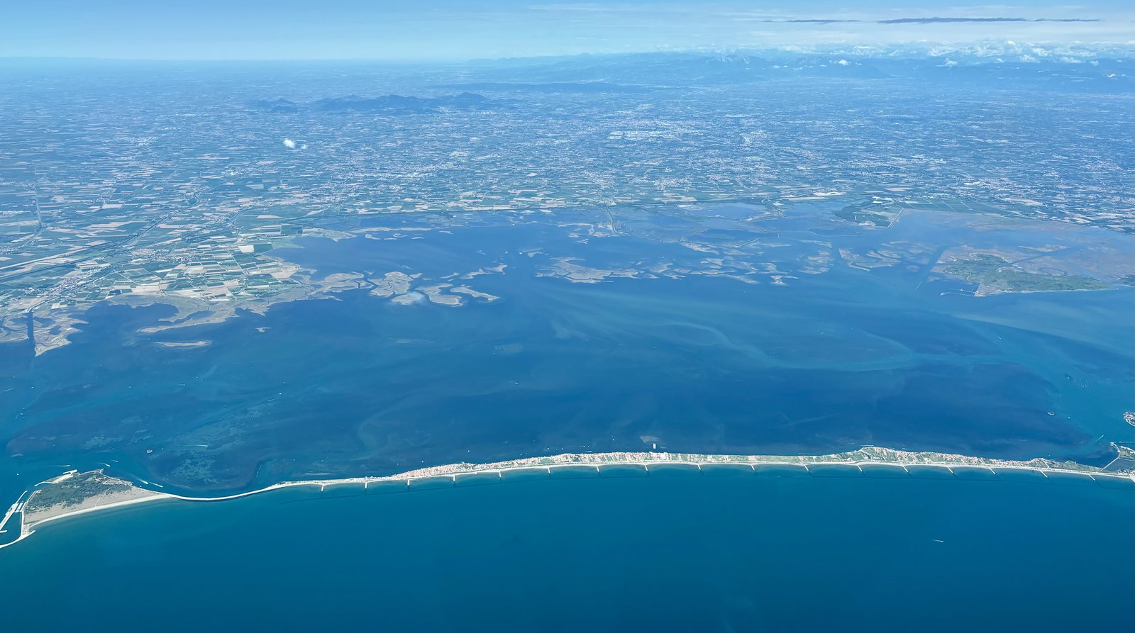 An aerial view of the lagoon's barene wetlands and channels.