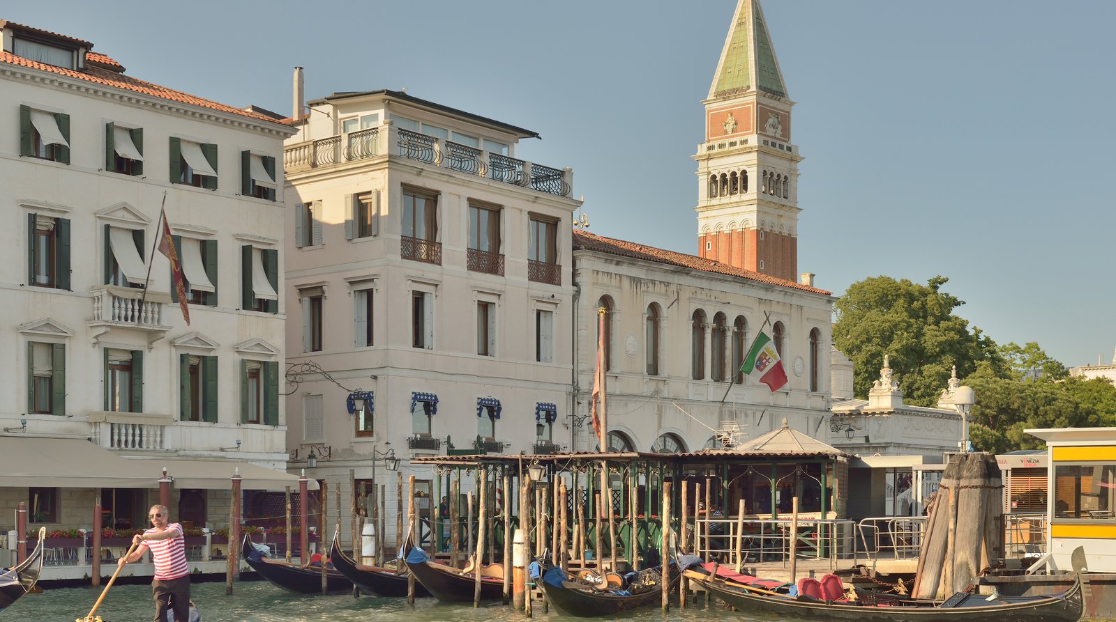 A canalside bar frontage on the Grand Canal in the early evening.