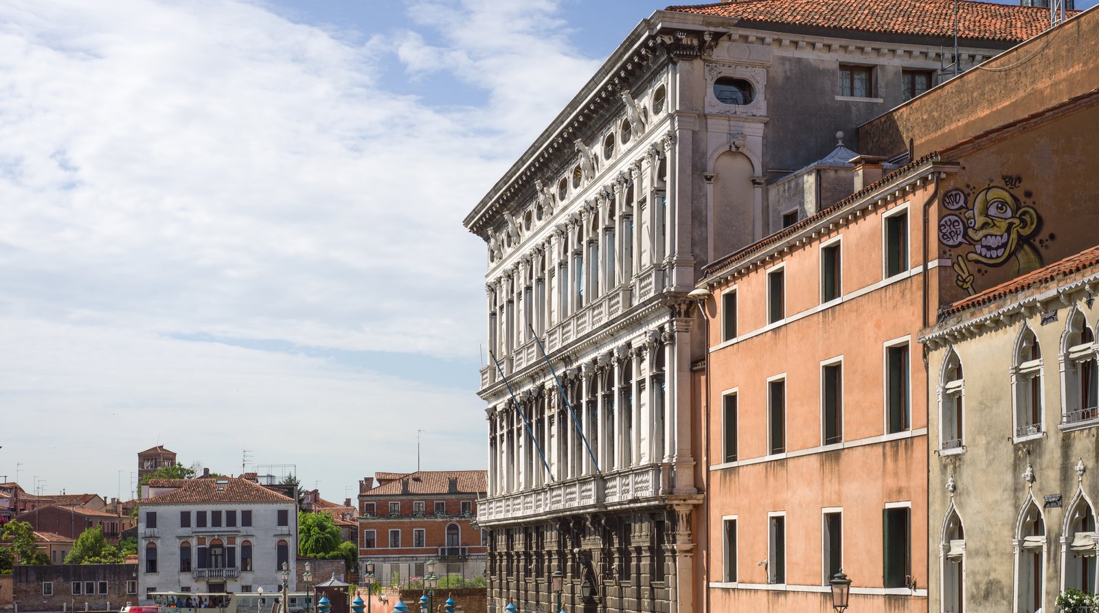 Palazzo Labia rising above the Cannaregio Canal in early morning light.