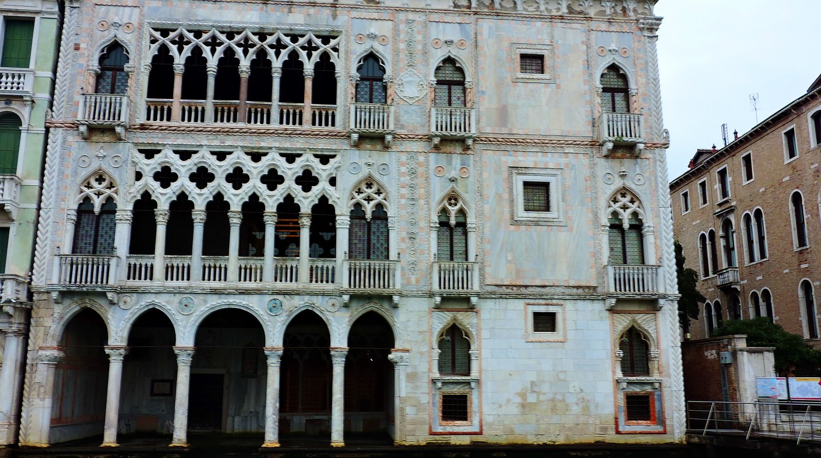 The ornate Gothic facade of Ca' d'Oro on the Grand Canal.